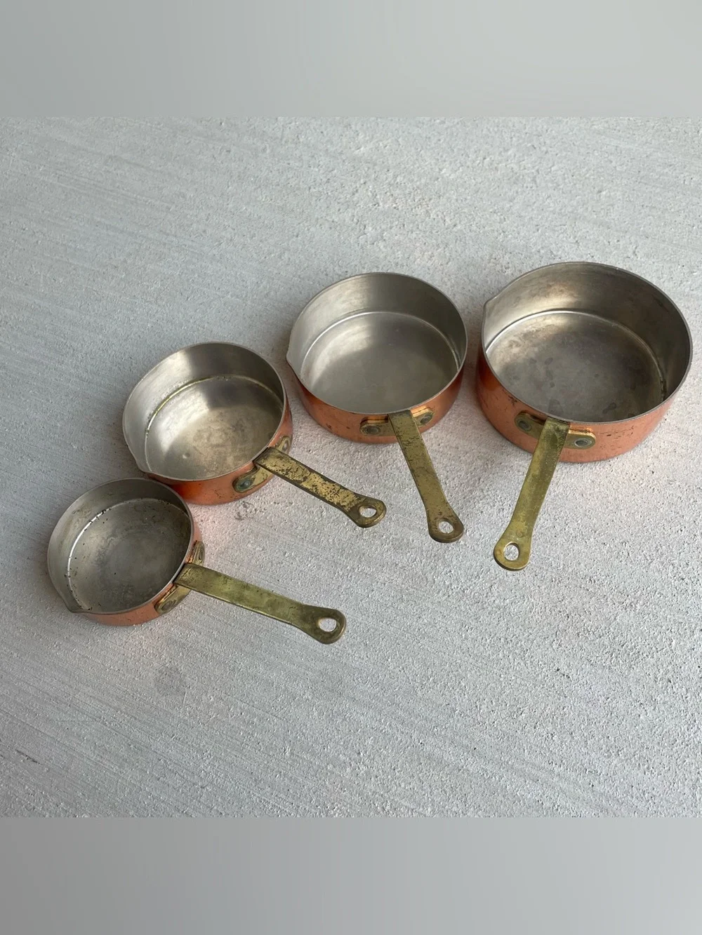 Set Of 4 Vintage Copper & Brass Handle Measuring Cups Nesting Pouring